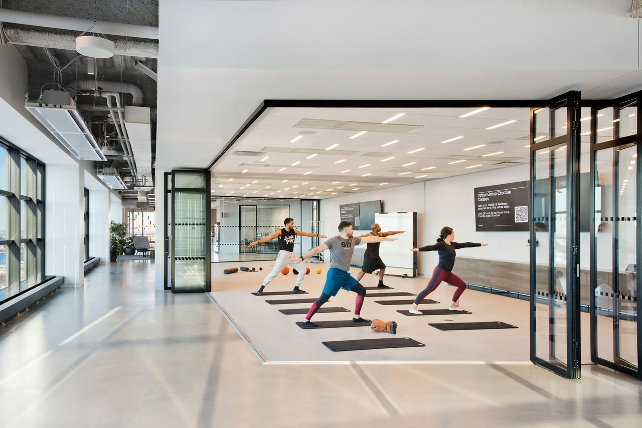 People working out in office gym
