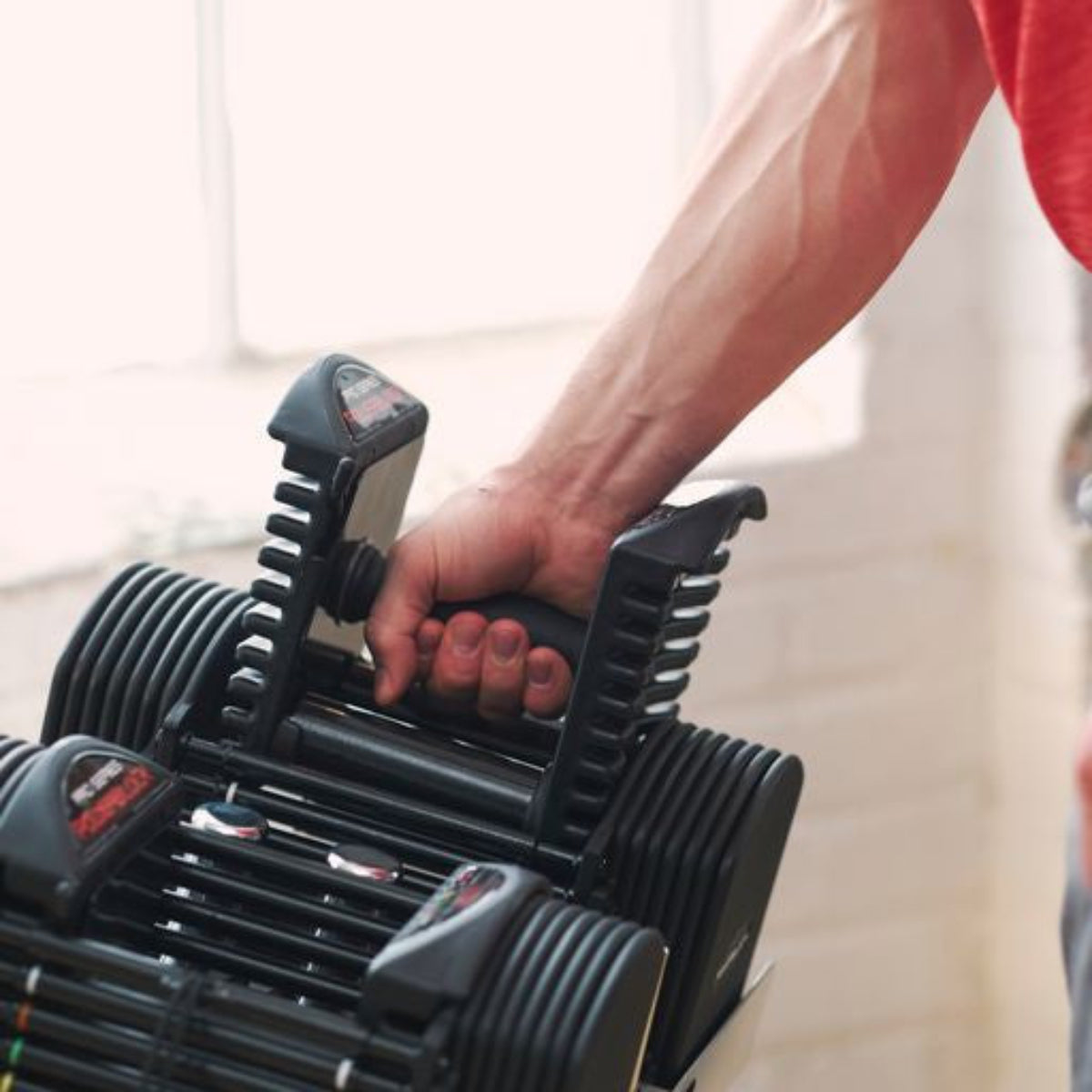 PowerBlock Pro 50 Set Dumbbell (5-50lbs) shown with Optional Stand - SOLD SEPARATELY
