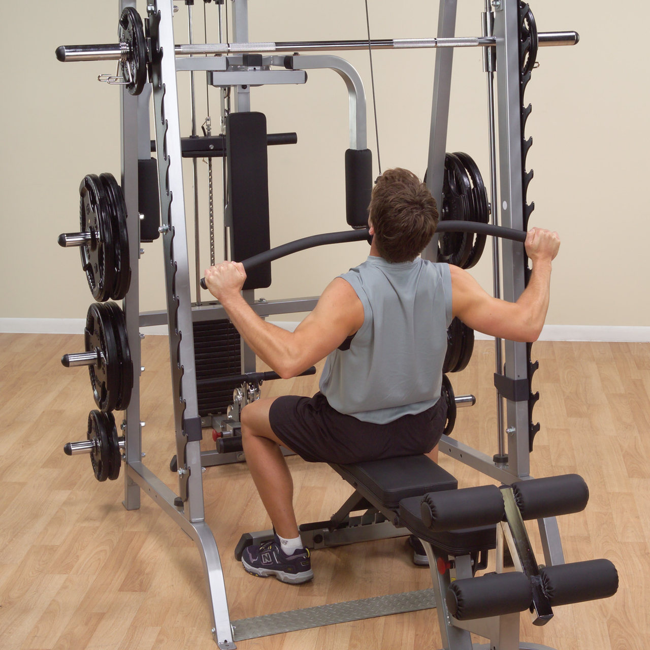 Body-Solid Series 7 Smith Gym shown with Optional Rubber Grip Olympic Weight Set