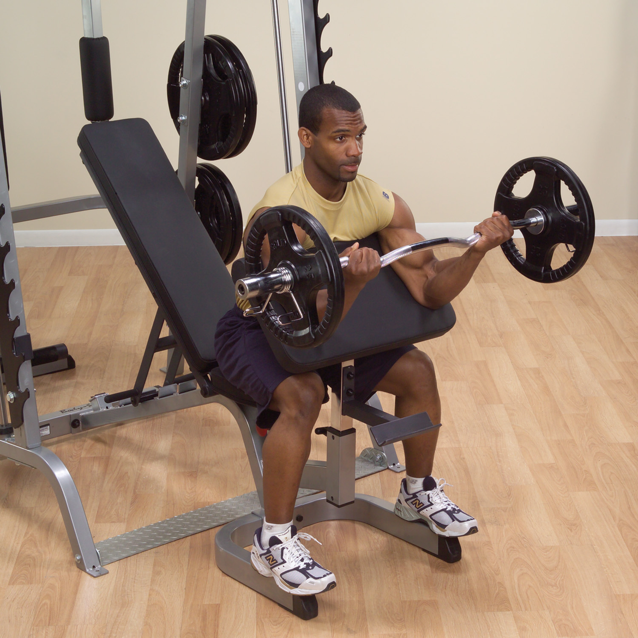 Body-Solid Series 7 Smith Gym shown with Optional Rubber Grip Olympic Weight Set & Preacher Curl (Sold Separately)