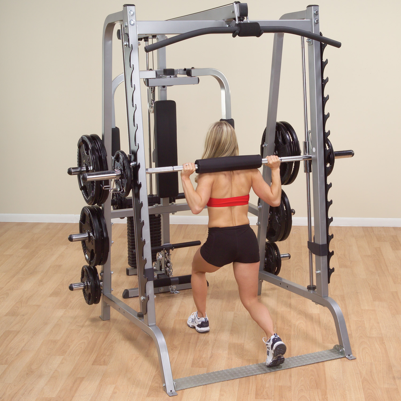 Body-Solid Series 7 Smith Gym shown with Optional Rubber Grip Olympic Weight Set