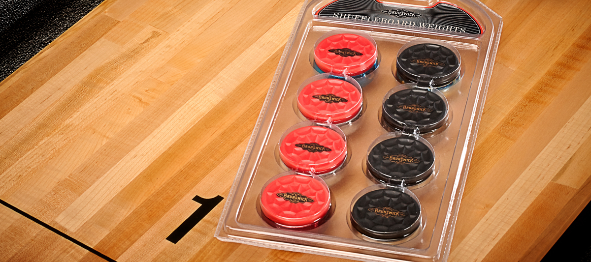 Brunswick Shuffleboard Weights, Red and Black Caps Pucks