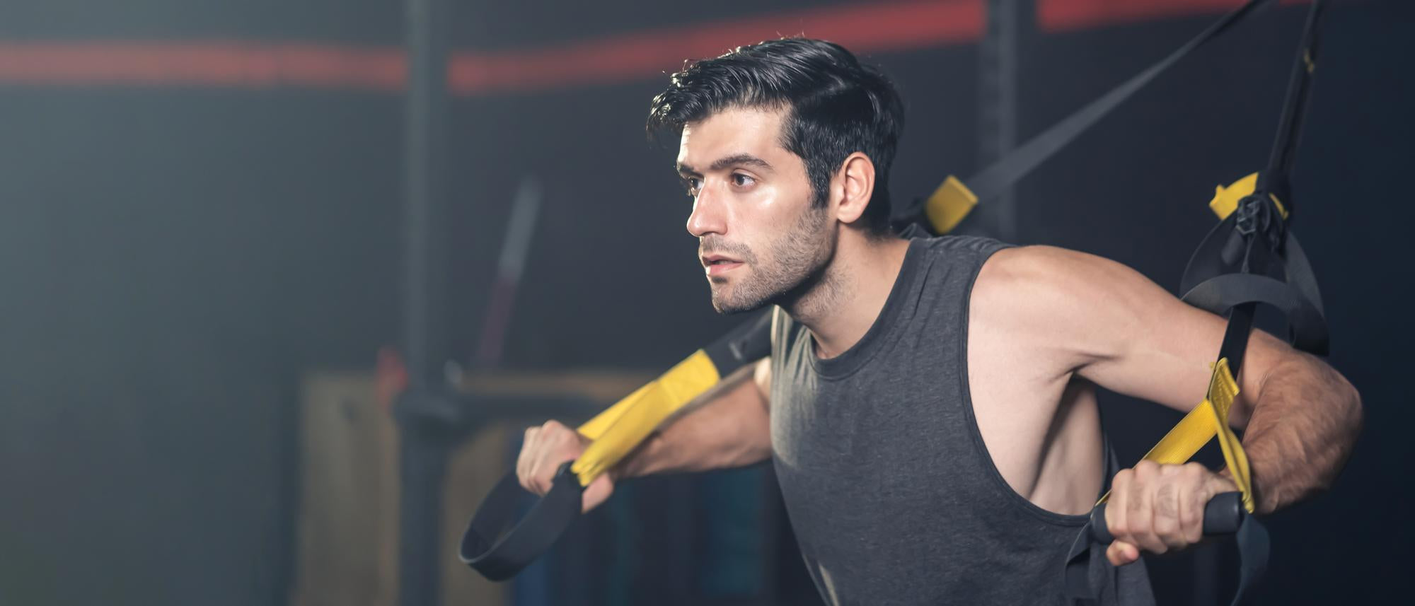 Man using rope pulling machine