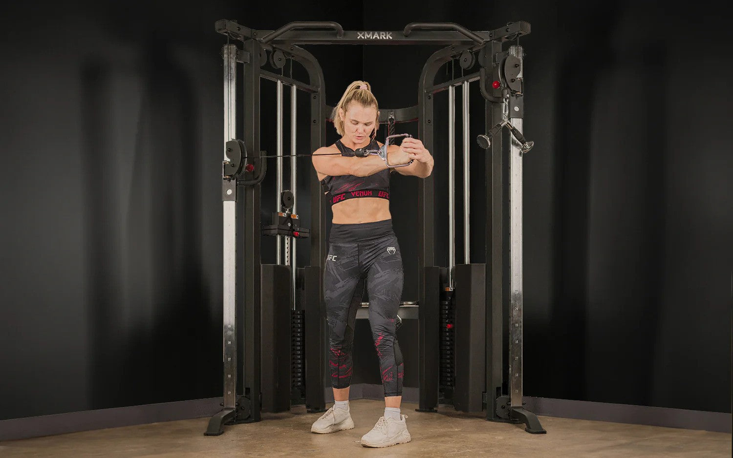 Woman using a functional trainer