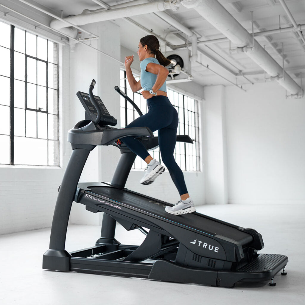 woman on a treadmill with incline