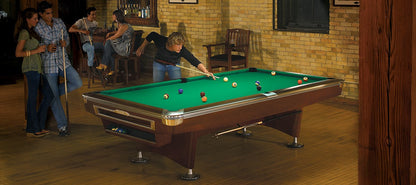 Brunswick Gold Crown VI Pool Table Shown in Skyline Walnut and Optional Gully Return